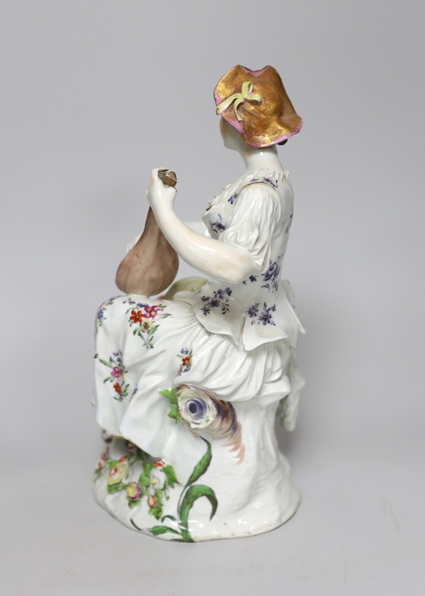 A large Derby figure of a shepherdess playing a lute, c.1760, 29cm